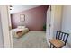 Cozy bedroom with carpeting, a comfortable bed, and a view of the closet at 884 W 15Th Ave, Apache Junction, AZ 85120