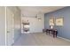 Spacious living room with high ceilings, neutral carpet, and a decorative table with artwork at 884 W 15Th Ave, Apache Junction, AZ 85120