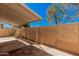 Covered patio and brick-lined landscaping in the backyard at 927 E Charleston Ave, Phoenix, AZ 85022
