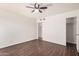 Spacious bedroom featuring wood floors, and a walk-in closet at 927 E Charleston Ave, Phoenix, AZ 85022