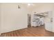 Bright dining area next to the kitchen, featuring neutral walls and vinyl wood-look flooring at 927 E Charleston Ave, Phoenix, AZ 85022