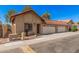 Exterior of home with two-car garage, desert landscaping and well maintained lawns at 927 E Charleston Ave, Phoenix, AZ 85022