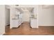 Well-lit kitchen with white cabinetry, modern appliances, and ample counter space, perfect for cooking at 927 E Charleston Ave, Phoenix, AZ 85022