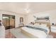 Relaxing main bedroom featuring a sliding glass door to the patio and a comfortable bed at 927 E Charleston Ave, Phoenix, AZ 85022