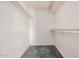 Walk-in closet with carpeted floor and white walls with adjustable shelving at 927 E Charleston Ave, Phoenix, AZ 85022