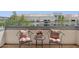 Cozy balcony features seating with views of surrounding city landscape and neighborhood at 945 E Playa Del Norte Dr # 3009, Tempe, AZ 85288