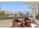 Comfortable balcony with wicker furniture and views of the building exterior at 945 E Playa Del Norte Dr # 3009, Tempe, AZ 85288