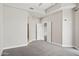 Spacious carpeted bedroom with multiple closets and doorways offering ample storage and flow at 945 E Playa Del Norte Dr # 3009, Tempe, AZ 85288