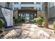 Inviting building entrance with manicured landscaping, a welcoming sign, and clear signage at 945 E Playa Del Norte Dr # 3009, Tempe, AZ 85288