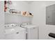 A convenient laundry room features a side-by-side washer and dryer at 945 E Playa Del Norte Dr # 3009, Tempe, AZ 85288