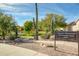 Saguaro Mountain Community Park entrance sign with walking path and lush trees at 9661 E Glencove Cir, Mesa, AZ 85207