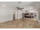 Expansive living space with tile floors, open to the kitchen and dining areas, perfect for entertaining and Gathering gatherings at 9661 E Glencove Cir, Mesa, AZ 85207