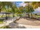 A community park features a playground, picnic gazebo, bench seating and mature trees providing shade at 9661 E Glencove Cir, Mesa, AZ 85207