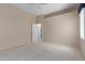 Bedroom with neutral colored walls and carpet at 9717 W Purdue Ave, Peoria, AZ 85345