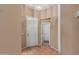 Entryway with a neutral color palette and tile flooring at 9717 W Purdue Ave, Peoria, AZ 85345