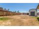 Large backyard features rock ground cover and extra storage shed with a swing set at 9801 N 56Th Dr, Glendale, AZ 85302