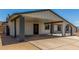 Exterior showing covered carport, ample parking space, and convenient access to the home's entrance at 9801 N 56Th Dr, Glendale, AZ 85302