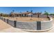 Street view of a single-story home with xeriscaping and a decorative concrete block perimeter wall at 9801 N 56Th Dr, Glendale, AZ 85302