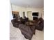 Spacious living room features tile floors and ample seating at 1038 S Palomino Creek Dr, Gilbert, AZ 85296