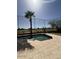 Backyard pool offers a refreshing escape with golf course views at 1038 S Palomino Creek Dr, Gilbert, AZ 85296