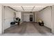 Spacious garage with storage cabinets and room for organization and multiple vehicles at 10702 W Salem Dr, Sun City, AZ 85351