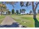 Scenic view of a meticulously maintained golf course with lush green fairways and mature trees at 10702 W Salem Dr, Sun City, AZ 85351