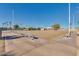 Expansive lawn bowling area with shaded seating and meticulous maintenance at 10702 W Salem Dr, Sun City, AZ 85351