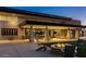 Wonderful backyard patio with outdoor fireplace and ample seating at 10715 E Thornton Ave, Mesa, AZ 85212