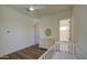 Bright Bedroom with a crib and changing table that leads into the bathroom at 10715 E Thornton Ave, Mesa, AZ 85212