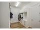 Walk-in closet with white cabinets and drawers, ideal for maximum storage at 10715 E Thornton Ave, Mesa, AZ 85212