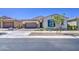 Beautiful single-story home with desert landscaping, attached garage, and a welcoming facade at 10715 E Thornton Ave, Mesa, AZ 85212