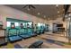 Bright and airy fitness center featuring treadmills, ellipticals, and weight training equipment at 10715 E Thornton Ave, Mesa, AZ 85212