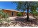 Backyard with gravel, wall and a covered patio at 11523 E Lindner Ave, Mesa, AZ 85209