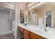 Bathroom with a shower, toilet, vanity and mirror at 11523 E Lindner Ave, Mesa, AZ 85209