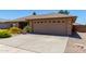 Charming single story home features desert landscaping and a spacious two-car garage at 11523 E Lindner Ave, Mesa, AZ 85209