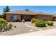 Charming single story home features desert landscaping and a quaint front patio at 11523 E Lindner Ave, Mesa, AZ 85209