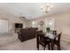 Bright living and dining area featuring neutral colors and lots of natural light at 11523 E Lindner Ave, Mesa, AZ 85209