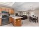 Open floor plan view of kitchen, dining, and living area at 11523 E Lindner Ave, Mesa, AZ 85209