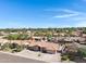 Picturesque aerial view of a residential area with well-spaced homes and mature landscaping at 1231 E Sunburst Ln, Tempe, AZ 85284