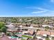 Scenic aerial view of a well-maintained residential neighborhood with lush greenery and beautiful homes at 1231 E Sunburst Ln, Tempe, AZ 85284