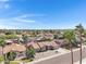 Overhead view of residential neighborhood showcasing tidy landscaping, mature trees and well-maintained homes at 1231 E Sunburst Ln, Tempe, AZ 85284