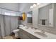 The bathroom features tiled floors, 2 mirrors, and shower at 1231 E Sunburst Ln, Tempe, AZ 85284
