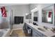 The bathroom has a shower and two sinks at 1231 E Sunburst Ln, Tempe, AZ 85284