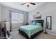 Comfortable main bedroom featuring a queen bed, lots of natural light, and neutral decor at 1231 E Sunburst Ln, Tempe, AZ 85284