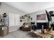 This office features a chair, carpet, and an American flag at 1231 E Sunburst Ln, Tempe, AZ 85284