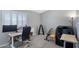 This is a nice office with a big window and carpeted floor at 1231 E Sunburst Ln, Tempe, AZ 85284