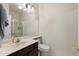 Functional bathroom with a single sink vanity, shower, and toilet at 1254 W Browning Way, Chandler, AZ 85286