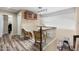 Hallway area with wood floors, seating, and a staircase leading to the lower level at 1254 W Browning Way, Chandler, AZ 85286