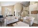 Bright living room with high ceilings, large windows, and wood-look flooring at 1254 W Browning Way, Chandler, AZ 85286