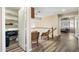 Spacious upstairs loft area features hardwood floors, closet and two chairs at 1254 W Browning Way, Chandler, AZ 85286